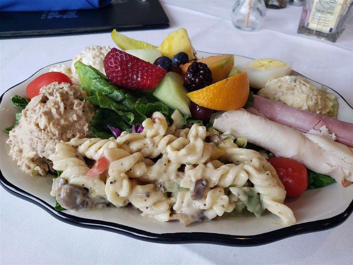 Something Different pasta salad served with fresh fruit